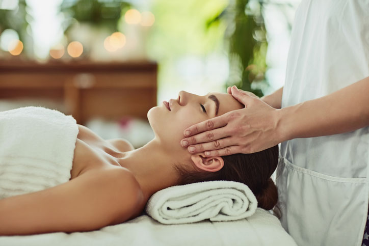 Woman being massaged in a Spa